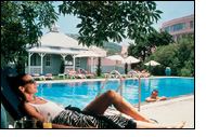 Relax by the pool at The Mount Nelson Hotel