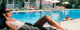 Relax by the pool at the Mount Nelson Hotel